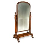 An early Victorian mahogany cheval mirror,