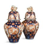 A large pair of Imari baluster vases, late 19th century,