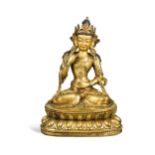 A Sino-Tibetan style gilt bronze figure of Tara,