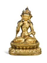 A Sino-Tibetan style gilt bronze figure of Tara,