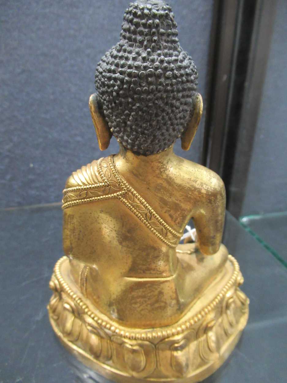 A Chinese gilt bronze figure of Buddha seated in meditation, - Image 10 of 13