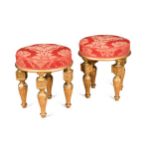 A pair of gilt wood and gesso stools, 19th century,