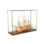 A wooden model of an 18th century sailing ship, 20th century,