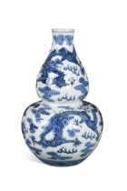 A blue and white double gourd vase, Qianlong, 19th century,