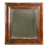 A walnut cushion framed mirror, 18th century,