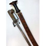 A North African rhinoceros horn-handled sword, circa 19th century,