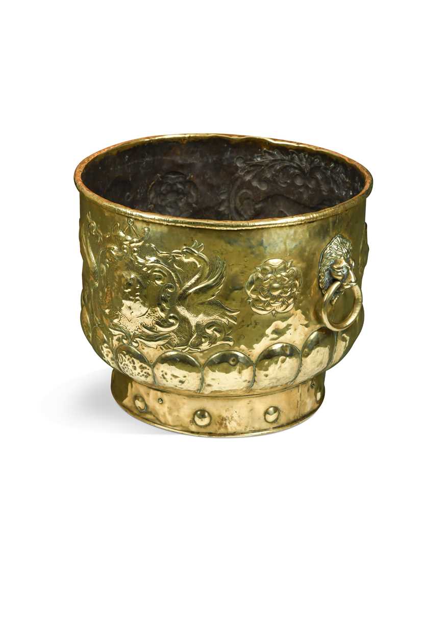 A Dutch embossed brass decorative log bin, 19th century,