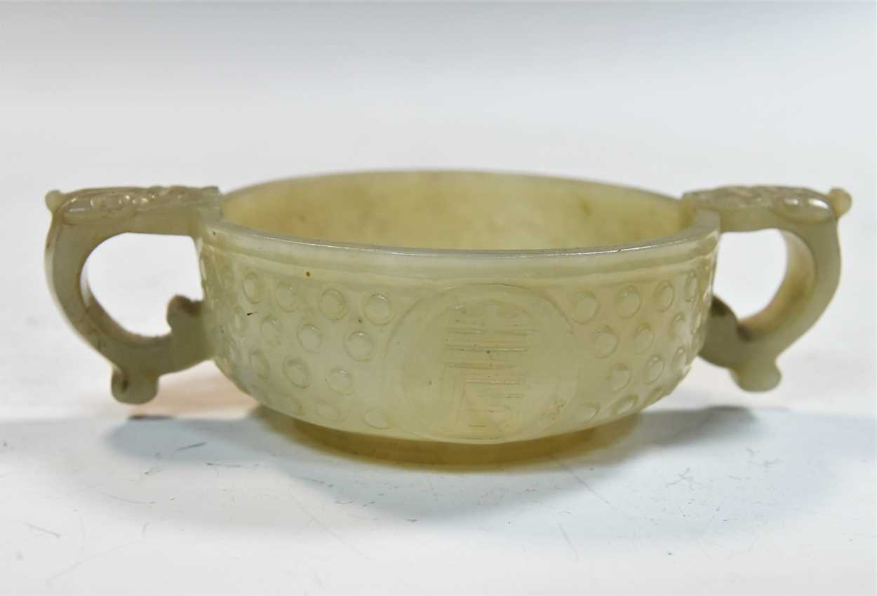 A Chinese jade tab-handled bowl in an archaic style, Qing Dynasty, 19th century, - Image 3 of 7