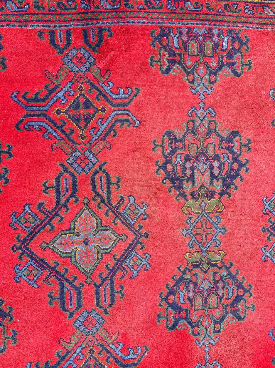 A large red ground Ushak carpet, circa 1930, - Image 4 of 9