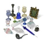 A collection of miniature blown glass wine glasses,