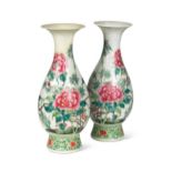 A pair of Chinese famille rose porcelain ovoid pedestal vases, late 19th century,