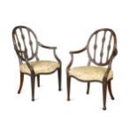 A pair of 'Hepplewhite' mahogany elbow chairs, late 18th century,