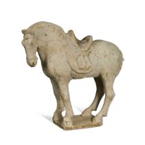 A pottery model of a standing horse, Tang Dynasty, probably late 7th to early 8th century,