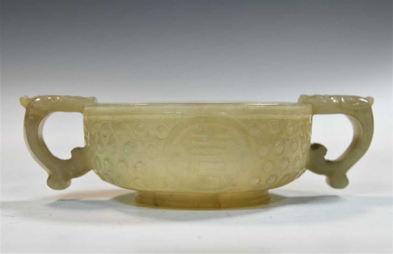 A Chinese jade tab-handled bowl in an archaic style, Qing Dynasty, 19th century, - Image 6 of 7