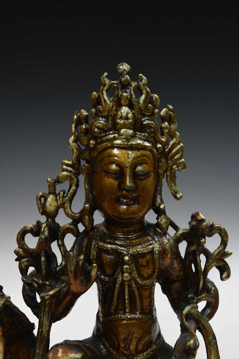 A Chinese gold lacquered bronze figure of a deity, late Ming Dynasty, - Bild 3 aus 23