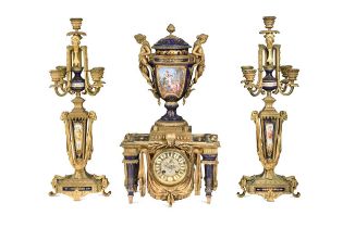 F. Barbedienne, a French ormolu and porcelain clock garniture, late 19th century,