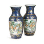 A pair of Chinese export 'famille verte' blue ground vases, Qing Dynasty, 19th century,