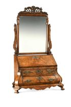 A Dutch style walnut dressing table mirror, early 20th century,