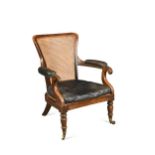 A William IV caned rosewood library armchair,