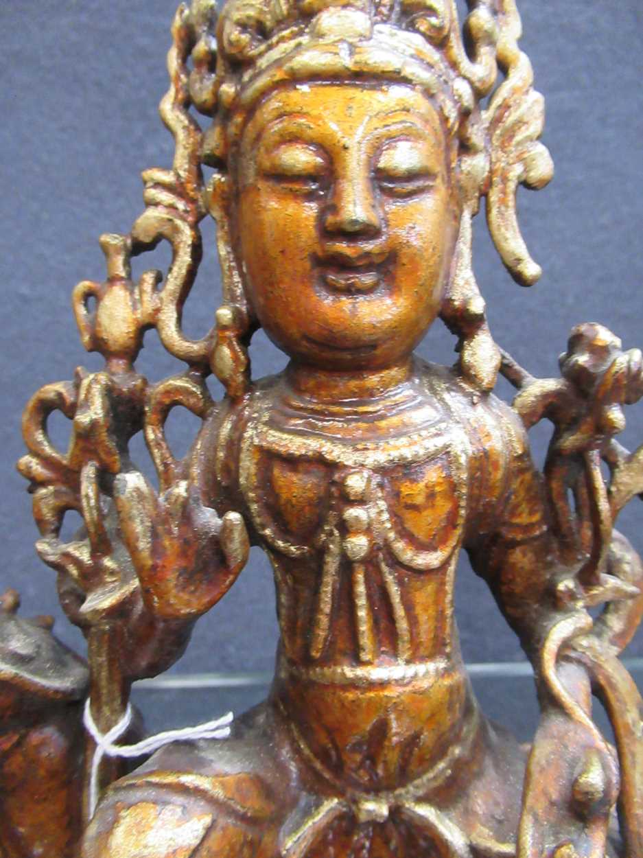 A Chinese gold lacquered bronze figure of a deity, late Ming Dynasty, - Bild 12 aus 23