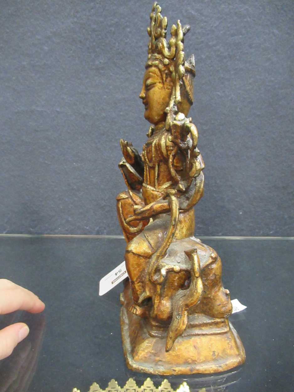 A Chinese gold lacquered bronze figure of a deity, late Ming Dynasty, - Bild 21 aus 23