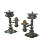 A pair of William IV bronze colza lamps,