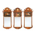 Three walnut and painted fret cut wall mirrors, 20th century,