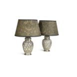 A pair of decorative white metal table lamps with handmade Bennison fabric shades,