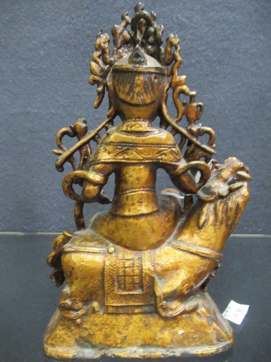 A Chinese gold lacquered bronze figure of a deity, late Ming Dynasty, - Bild 22 aus 23