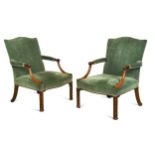 A pair of George III mahogany library armchairs, circa 1760,