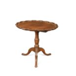 A mahogany piecrust tripod table, 19th century,
