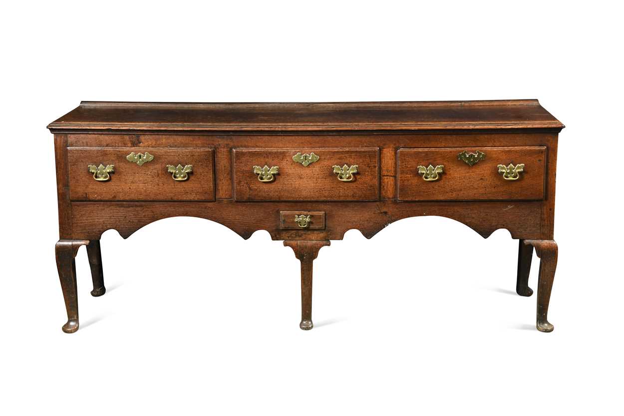 An oak and elm dresser base, 18th century,