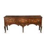 An oak and elm dresser base, 18th century,