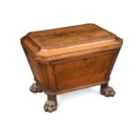 A Regency mahogany sarcophagus shaped cellarette,