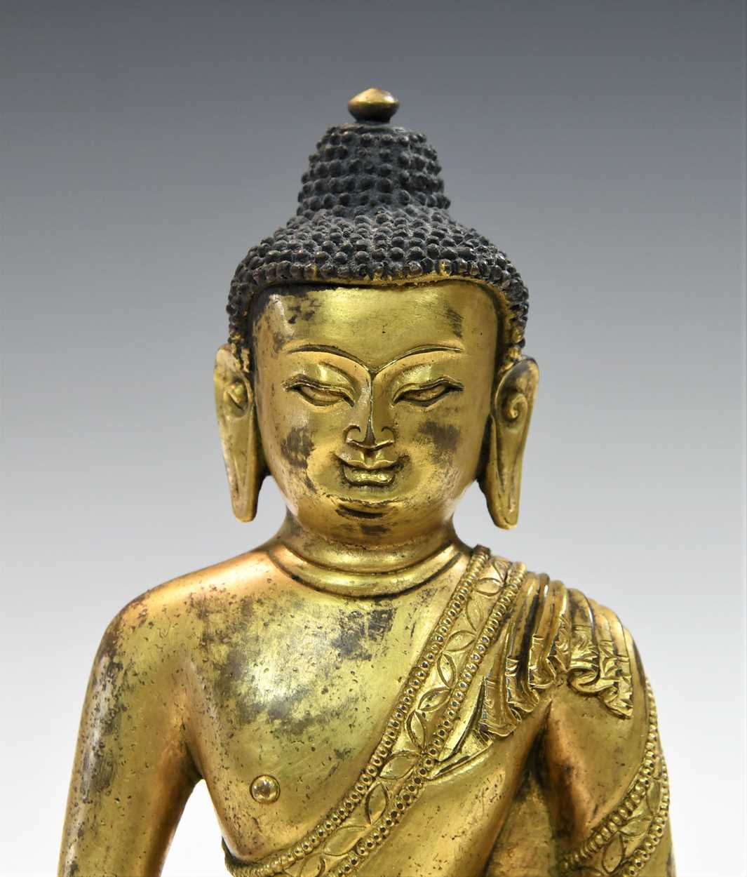 A Chinese gilt bronze figure of Buddha seated in meditation, - Image 2 of 13