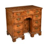 A George II burr oak kneehole desk,