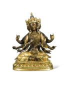 A Chinese gilt bronze multi-headed and multi-armed seated Avalokitesvara,