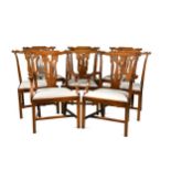 A set of eight George III style mahogany dining chairs,