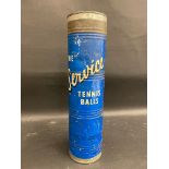 A cylindrical tin advertising 'The Service Tennis Balls', with contents, war time issue, still