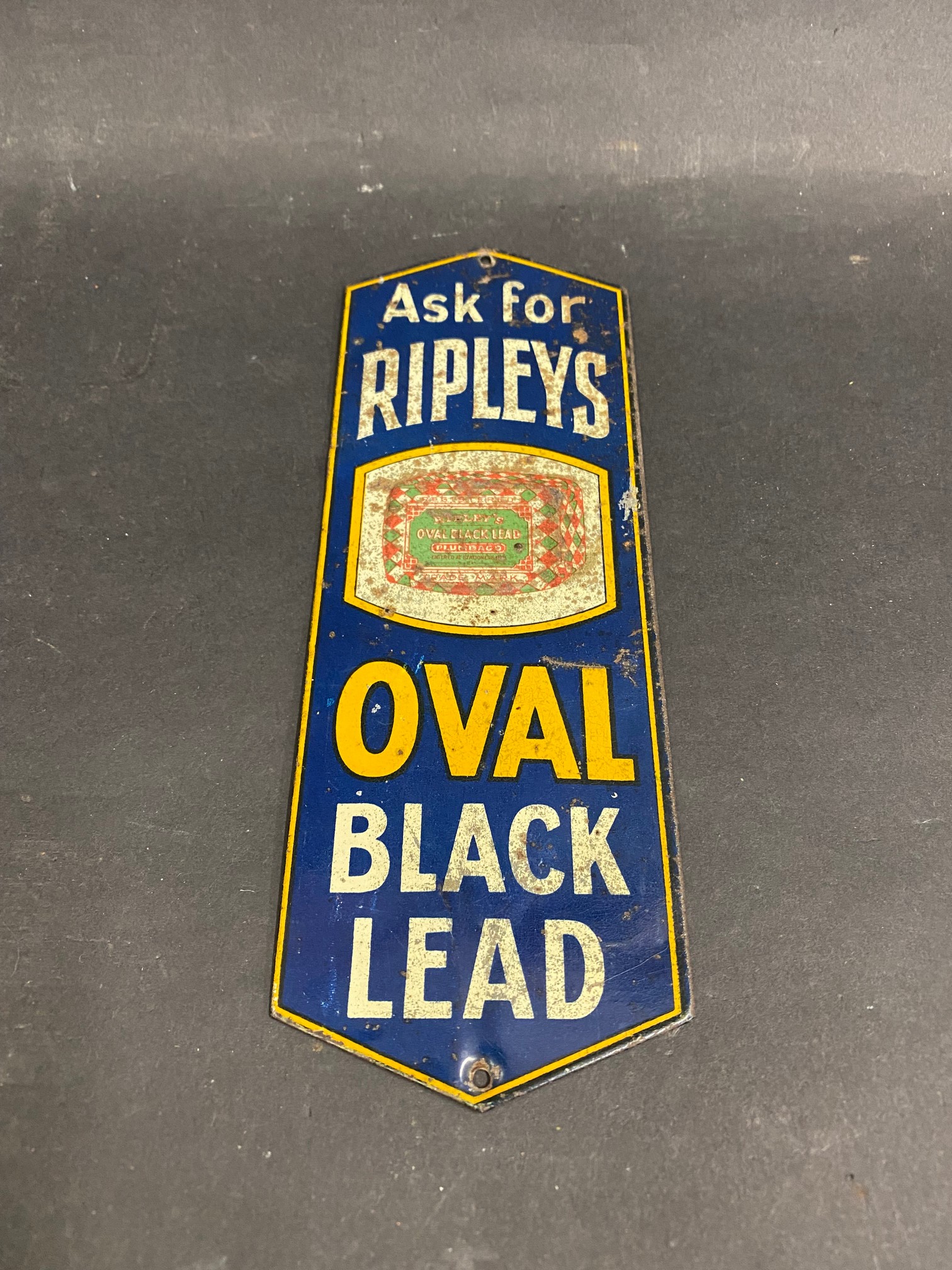 A Ripley's Oval Black Lead tin part pictorial finger plate, 3 x 8 1/2".