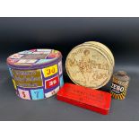 A Cadbury's Lucky Numbers Assortment tin, a Smith's White Fruit tin and two others.