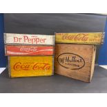 Five believed original wooden packing crates for carrying drinks bottles.