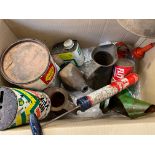A box of assorted oil cans and measures, including an Esso Flit gun, BP, Shell etc.