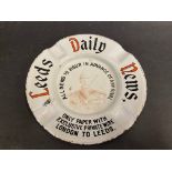 A Leeds Daily News 'Boer War' themed enamel ashtray, 5 1/2" diameter.