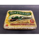 A Wills 'Main Line' Flake tobacco tin with an image of a steam locomotive to the lid, 6 1/2" w.