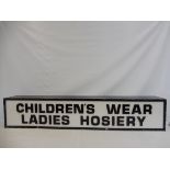 An unusual rectangular illuminated lightbox advertising 'Children's Wear Ladies Hosiery', 53" w x 10