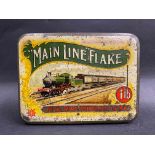A Wills 'Main Line' Flake tobacco tin with image of a steam locomotive to the lid, 6 1/2" w.