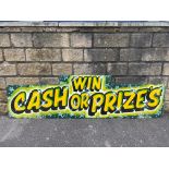 A 1990s sign for 'Win Cash or Prizes', 72 x 20".