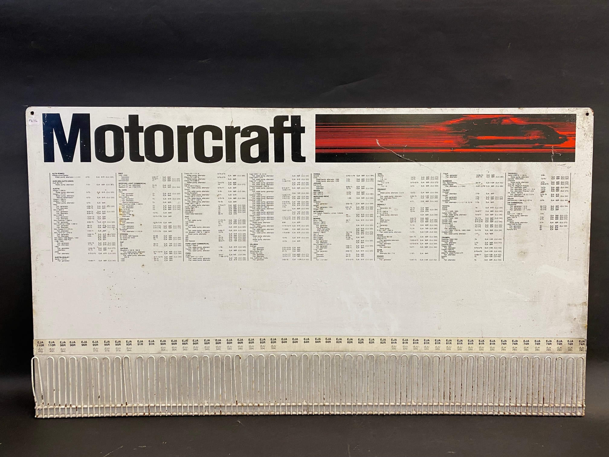 A Motorcraft rectangular tin advertising display board sign, 35 1/2 x 20".