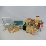 A selection of Sylvanian part sets including figures and accessories.